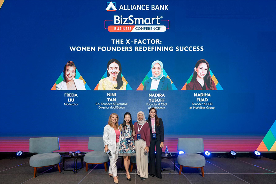 Standing together, Freda Liu and panelists Nini Tan, Nadira Yusoff, and Madiha Fuad embody the vision of women entrepreneurs building sustainable, impactful businesses.