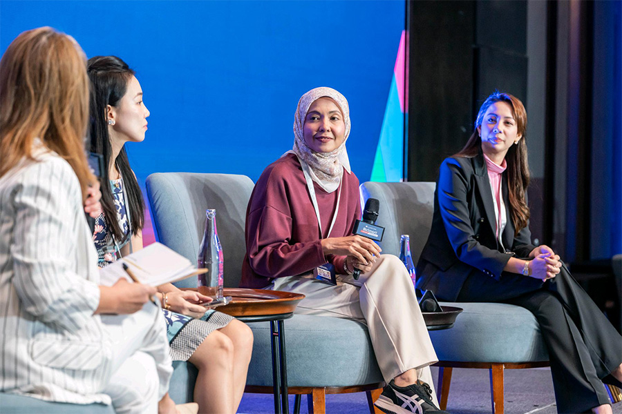 Nadira Yusoff, with fellow panelists, highlights Kiddocare’s efforts to support parents and empower women through flexible income opportunities.